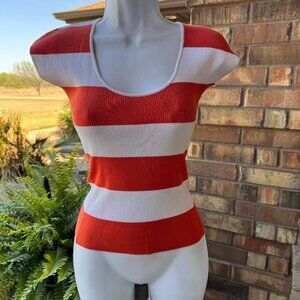 Essendi sweater; orange and white. Small